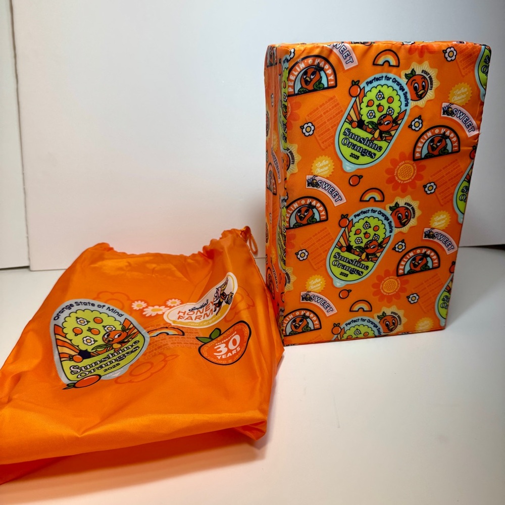 NWT. Disney Knee Pads 2025 Epcot Flower And Garden Orange Bird.